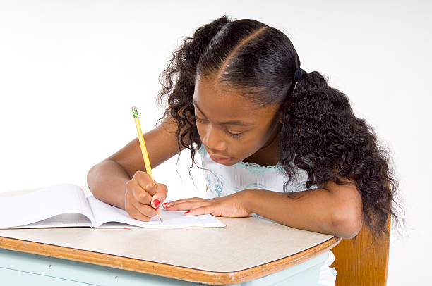 young girl doing school work